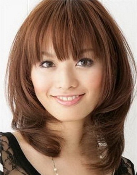 Medium Rounded Style with Fluffy Ends- Medium Layered haircuts for thick hair