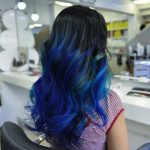 Vibrant blue black ombre hair color
