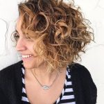 Angled Cut with Spirals Curls Medium Curly Hairstyles