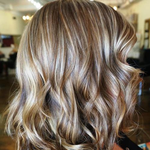 Angled Two-Tone Short and Sassy Hairstyle Grey Highlights