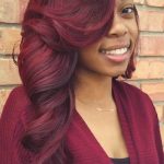 Side Swept Red Wavy Sew-In Hairstyles