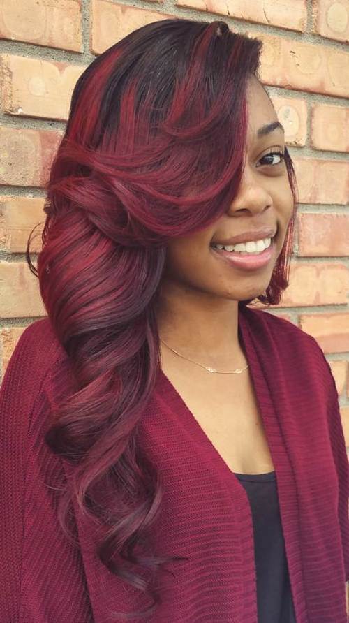 Side Swept Red Wavy Sew In Hairstyles
