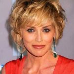 Voluminous Short Curly Hairstyle with Highlights- Hairstyles for Older Women