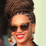 Top knot Beyonce rocking box braids