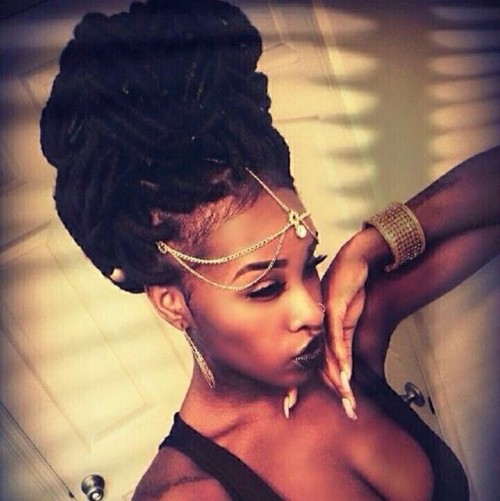 Tribal effect beehive big box braids bun