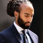 Formal oversized bun Long Hairstyles for Black Men