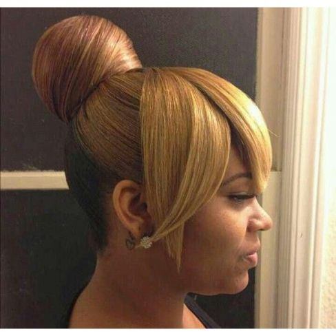 The Stylish Bun with Bangs weave hairstyles for black women 