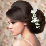 Stylish Bouffant with Flowers beach wedding hairstyles