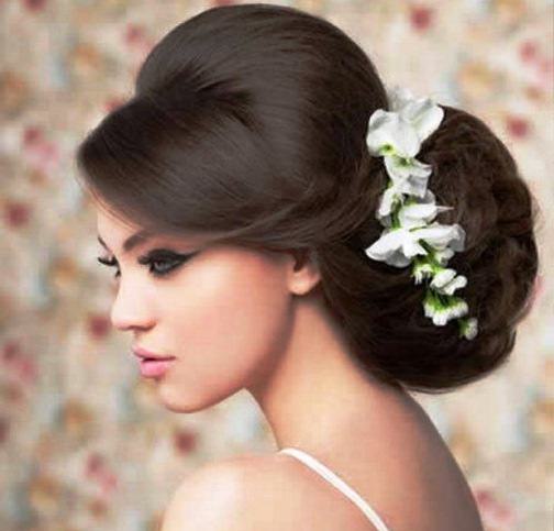 Stylish Bouffant with Flowers beach wedding hairstyles