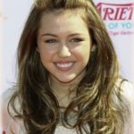 Poof with Curls Miley Cyrus haircuts