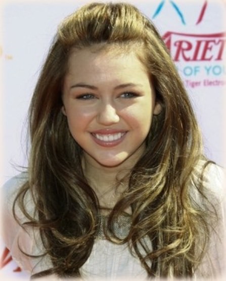 Poof with Curls Miley Cyrus haircuts