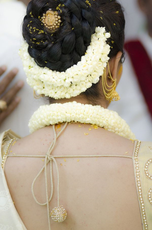 Braided bun Hairstyles for Indian Wedding 