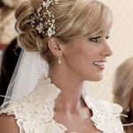 Beautiful Updo with a Veil beach wedding hairstyles