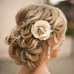 Updo with waves and Wisps mother of the bride hairstyles