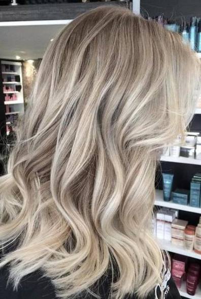 Curly Caramel Hairstyle- Blonde balayage looks