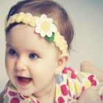 Baby girl with flora headpiece baby girl hairstyles