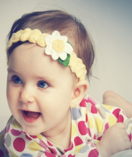 Baby girl with flora headpiece baby girl hairstyles