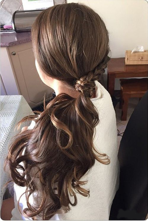 Low Ponytail with a Braid Wrap Wavy Ponytail hairstyles