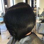 Short Bob with a Signature Curl Short Straight Hairstyles and Haircuts