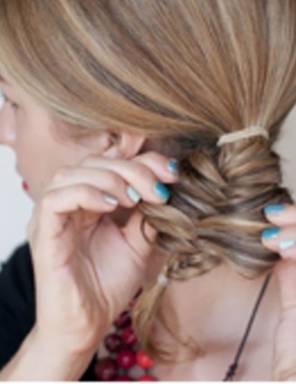 Stretch the braid to make fishtail braid hairstyle