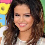 Swept Back Medium Waves- Best Selena Gomez Hairstyles