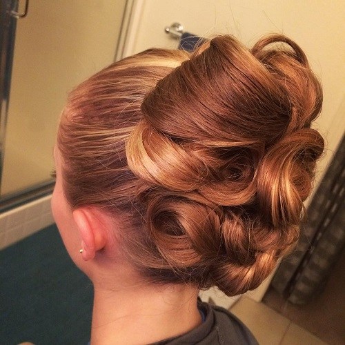 Thickly Curled Updo Hairstyles for Wedding Guests