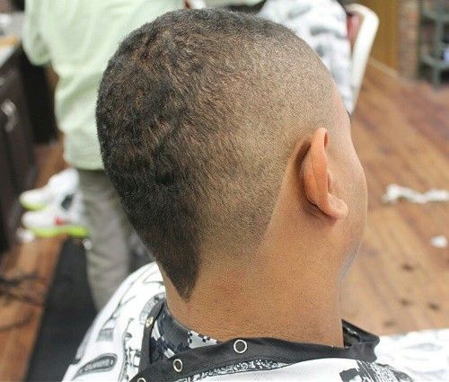 subtle Buzz Curly hairstyles for black men