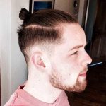 With a Pony at the Top Undercut Hairstyles for Men