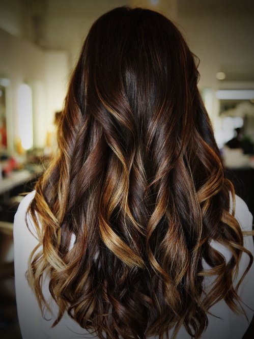 Go for the Long Curls caramel highlights for women