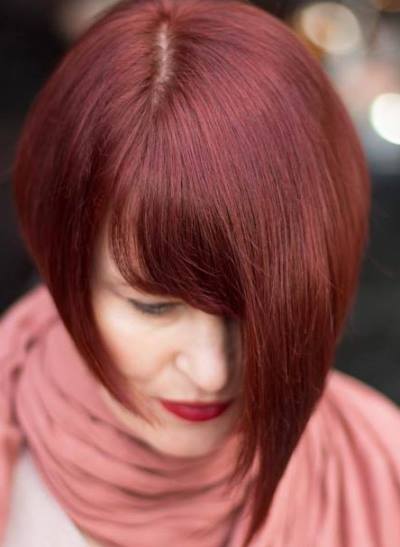 Asymmetrical Auburn Cut- Shades of red hair