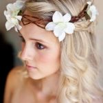 Long waves with floral crown wedding hairstyles for long hair