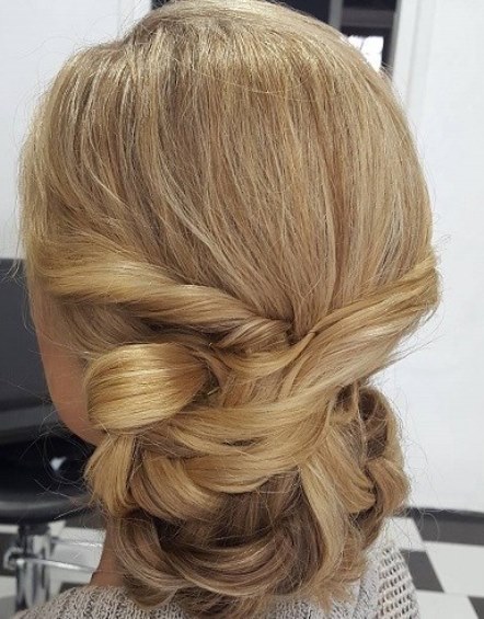 Low Bun Hairstyles with a Twist-