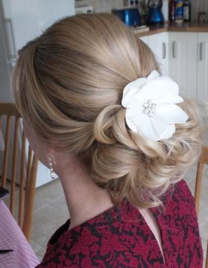 Low Petal-Like Bun hairstyles for prom